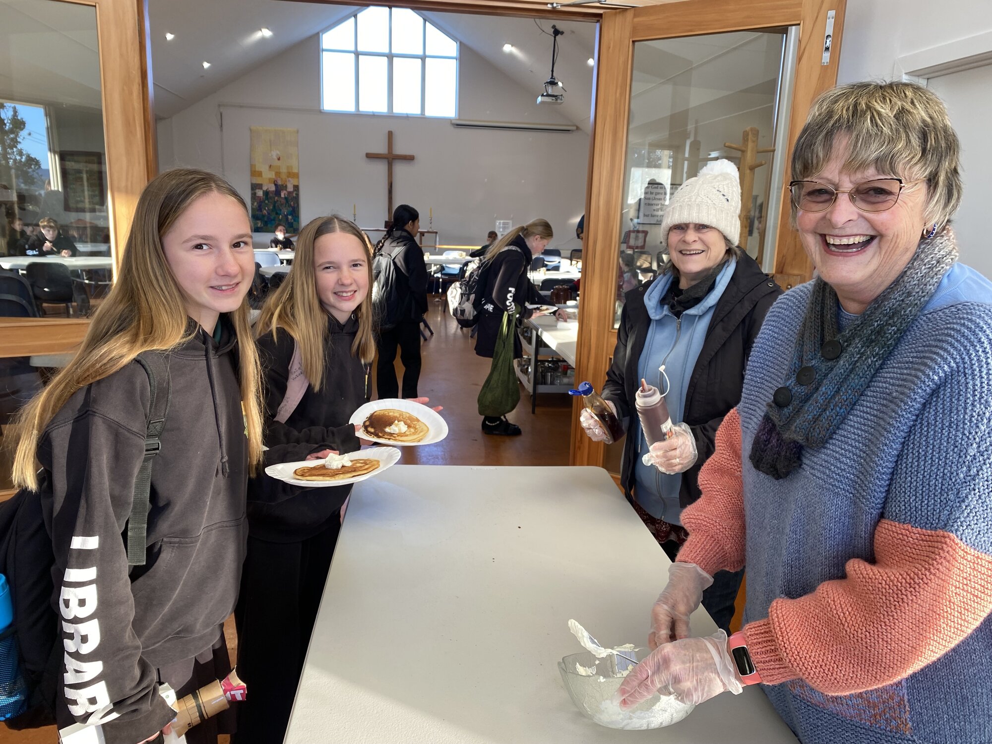  Year 8 twins Ada and Hazel Warren at Student Pancake Thursday inside St Peter&rsquo;s Anglican Church. Photo / Merle Cave