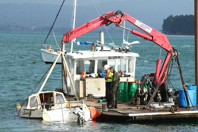 SunLive Sunken vessel in Tauranga Harbour being re floated The